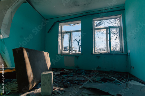 destroyed and burned houses in the city in Ukraine photo