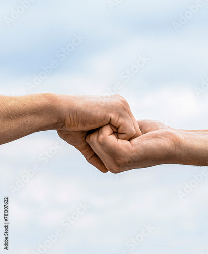 Helping hand outstretched, isolated arm, salvation. Close up help hand. Helping hand concept and international day of peace, support. Two hands, helping arm of a friend, teamwork © Yevhen