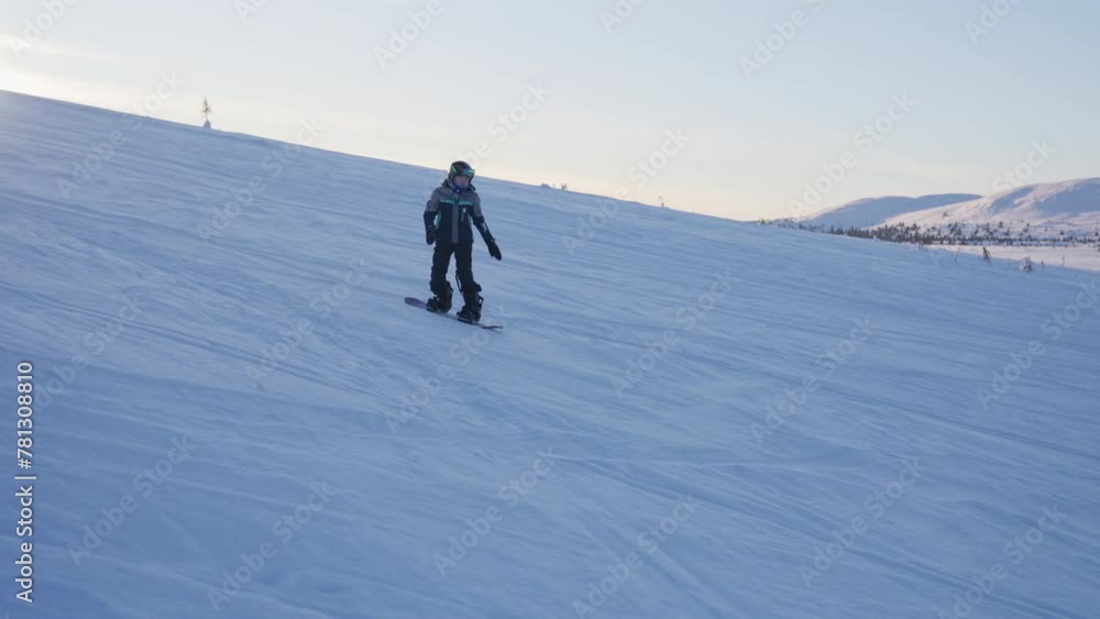 Boy's Lone Snowboarding Descent Boy's Lone Snowboarding Descent