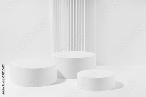 Abstract stage with three white round podiums with striped pillar as decoration, mockup on white background. Template for presentation cosmetic products, gifts, advertising, display in simple style. © finepoints