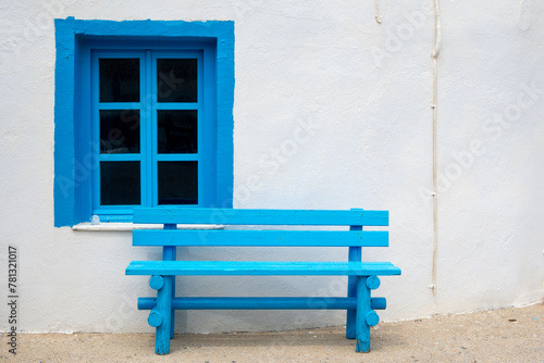 White blue facade of Greek building in Mandraki port on the island of Nisyros. Dodecanese, Greece © vivoo