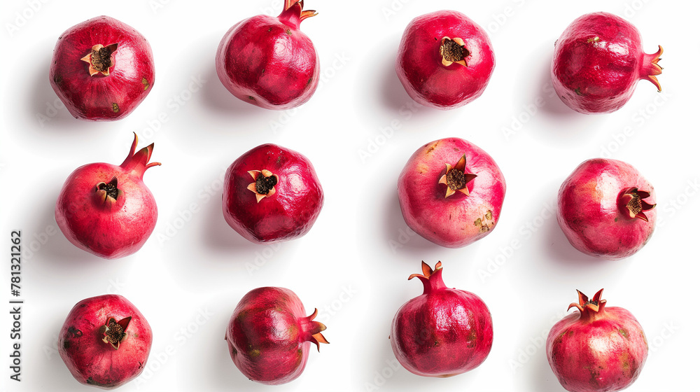 Set of fresh pomegranates isolated on a white background, top view, showcasing the majestic beauty and deep, ruby red hues of the fruit, arranged to highlight their round, robust form and the richness Set of fresh pomegranates isolated on a white background, top view, showcasing the majestic beauty and deep, ruby red hues of the fruit, arranged to highlight their round, robust form and the richness
