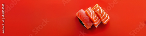A close-up of pieces of sushi on red background, Concept for Food Magazine, Japanese Cuisine Promotion, Menu, Poster, Banner