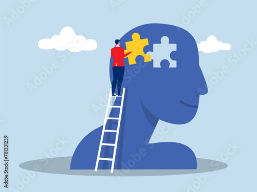 psychological help and support,man people putting puzzle pieces of person head people treating personality disorder National Mental Health awarenessconcept
