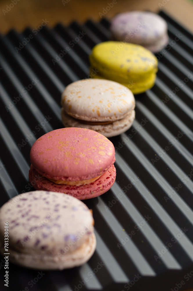 Fototapeta premium macaroons on wooden background