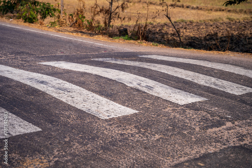 Photography Speed bump on empty street. Road rules
