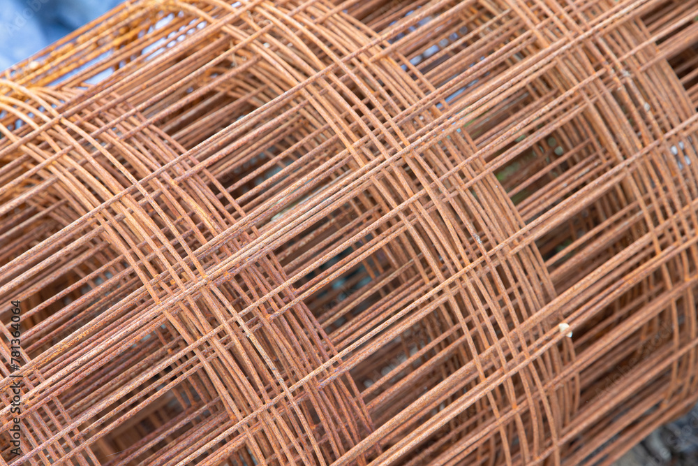 Roll of steel mesh for construction in oxidation state. Abstract image. Roll of steel mesh for construction in oxidation state. Abstract image.