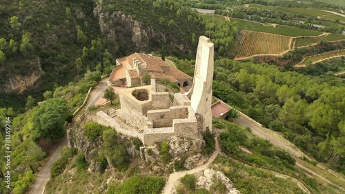 Old castle in Spain, Castell de Subirats near Barcelona, Catalonia. Touristic place, drone view of a fortress. photo