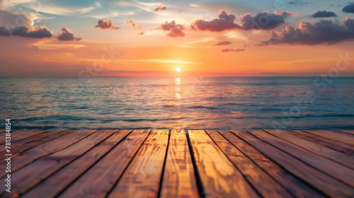 Sun setting over a wooden pier