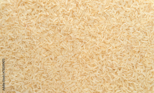 Basmati rice steamed close-up texture, brown rice background top view