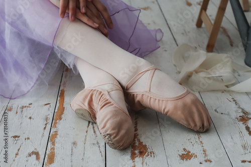 Ballet pointe shoes. Ballerina legs. Close-up. Selective focus. Copyspace