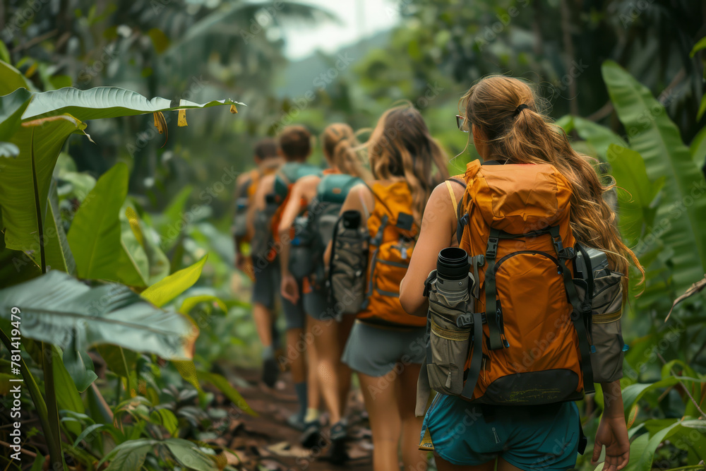 A team of adventurers with cameras trekking through the dense foliage of a tropical rainforest, exploring and capturing nature..