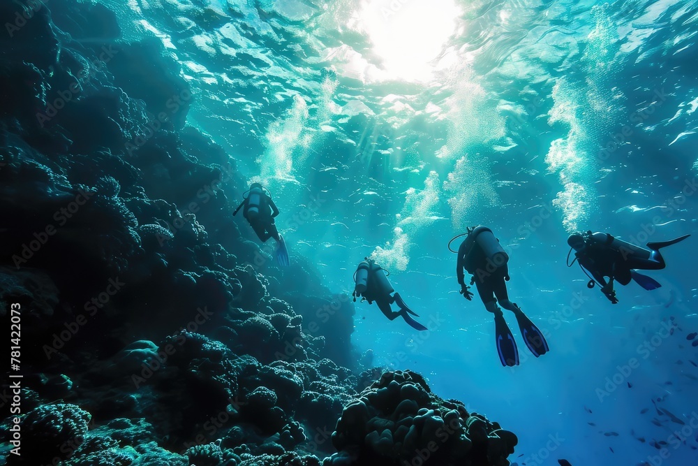 Obraz premium Scuba Diving Men in Blue Water, Diving in the Great Barrier Reef, Tropical Divers, Deep Underwater