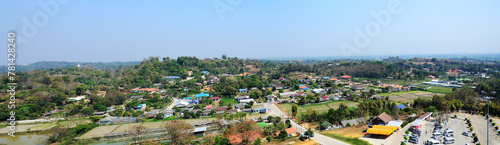 Panorama view landscape local Rim Kok village rural and Chiangrai country countryside on mountain hill of Wat Huay Pla Kang temple for thai people foreign traveler travel visit in Chiang Rai, Thailand