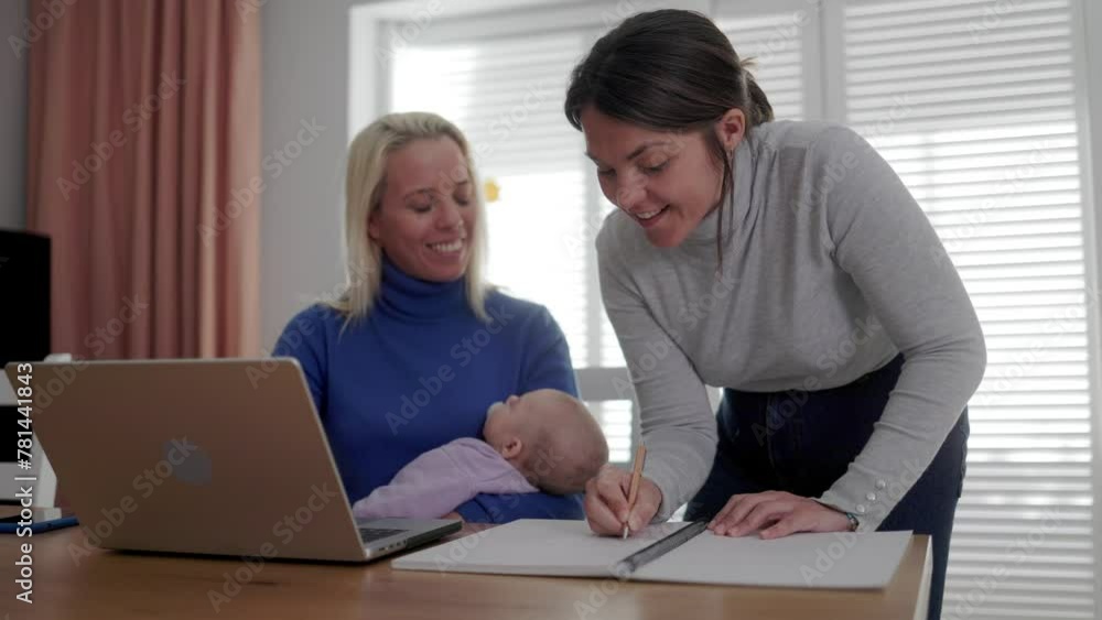 Gay couple of mothers and newborn baby using laptop computer at home. Lgbt lesbian family concept Gay couple of mothers and newborn baby using laptop computer at home. Lgbt lesbian family concept