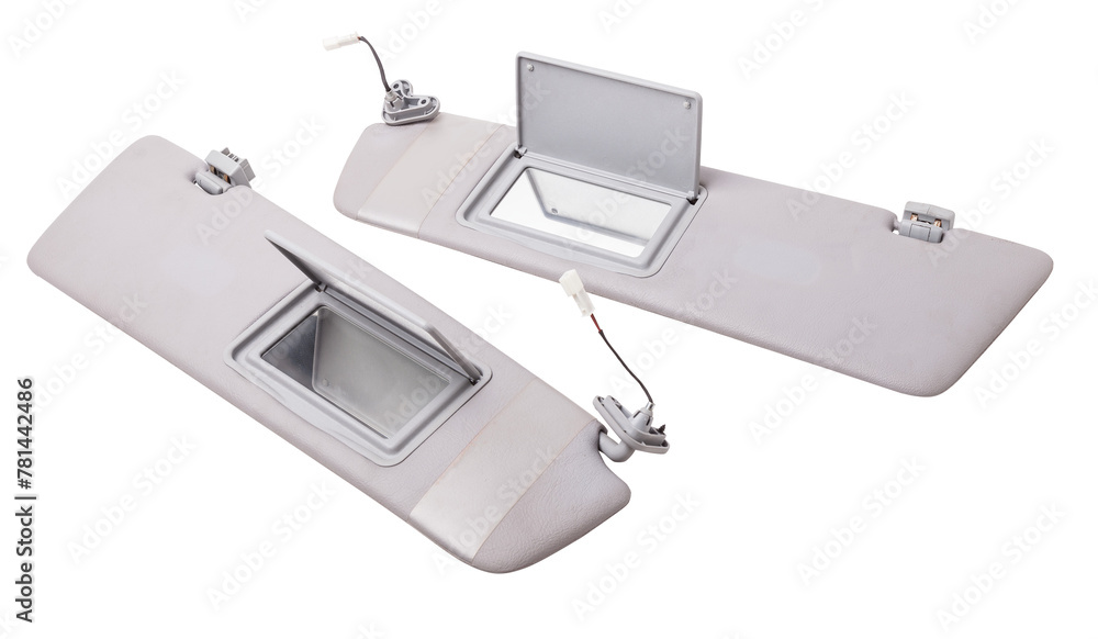 Sun visor with a mirror made of light gray plastic on a white background in a photo studio. Spare part of the car interior for replacement in a car service or for sale on auto dismantling. Sun visor with a mirror made of light gray plastic on a white background in a photo studio. Spare part of the car interior for replacement in a car service or for sale on auto dismantling.