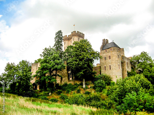 An old fairytale like castle in the German Countryside, named Kassel, situated on Kasselberg near Pelm in the Vulcaneifel geopark photo