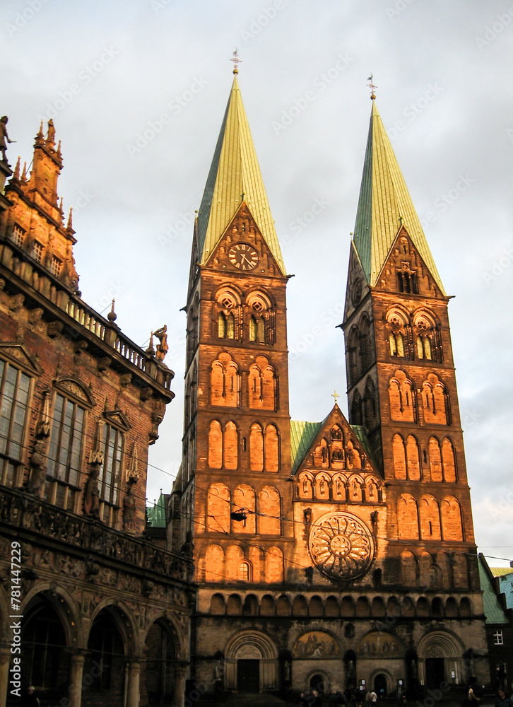 The last light of the afternoon, illuminating the towers of the Bremen Catherdral (St Petri Dom zu Bremen), situated in the historic Bremen Market square.