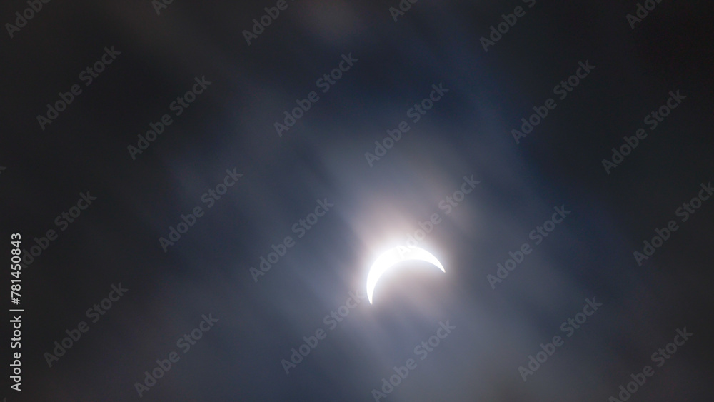Eclipse abstract moving clouds closing sun copy space background image Eclipse abstract moving clouds closing sun copy space background image
