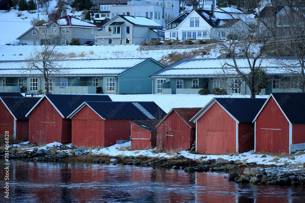 Row of boat garages in Sula island, Norway.