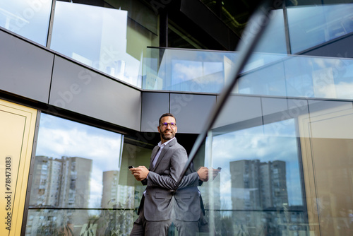 Confident Businessman Smili...
