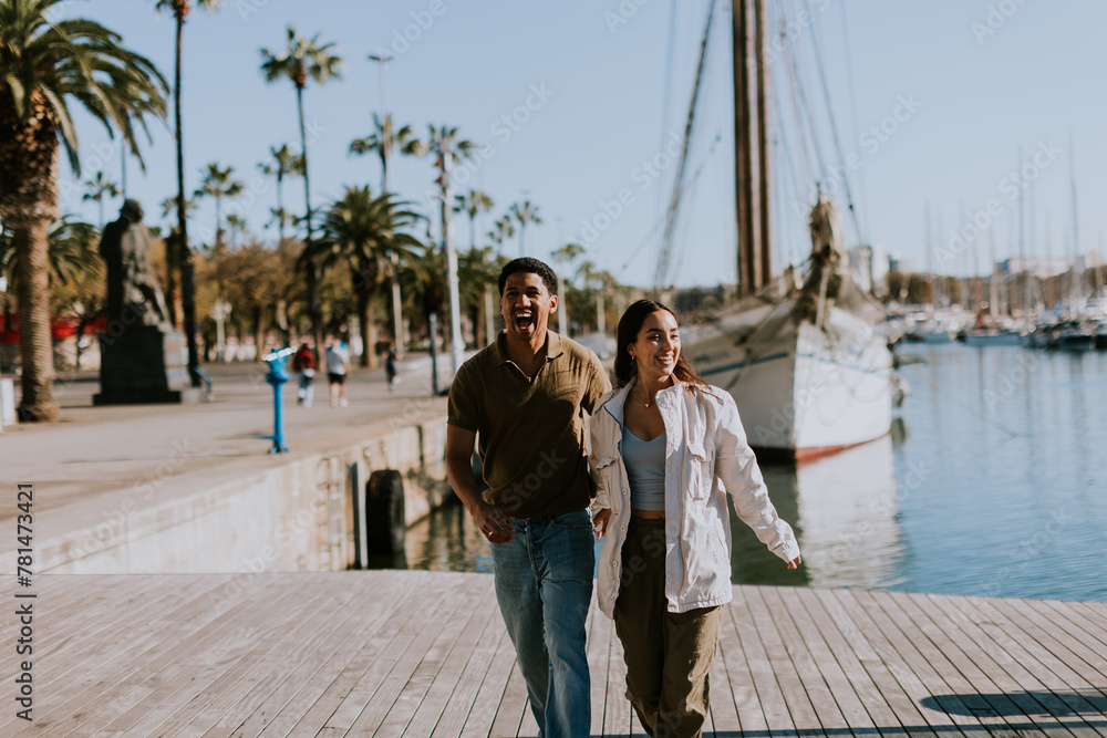 Serene stroll along Barcelona marina at with vintage sailing vessel