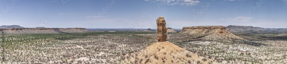 Drone panorama of the landscape around the famous Vingerklip rock needle in northern Namibia during the day