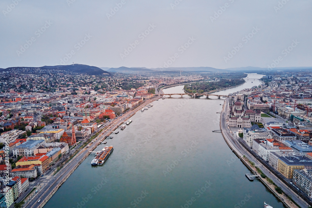 Panoramic view on skyline of Budapest along Danube River. Aerial view of capital of Hungary with historical buildings and famous landmarks