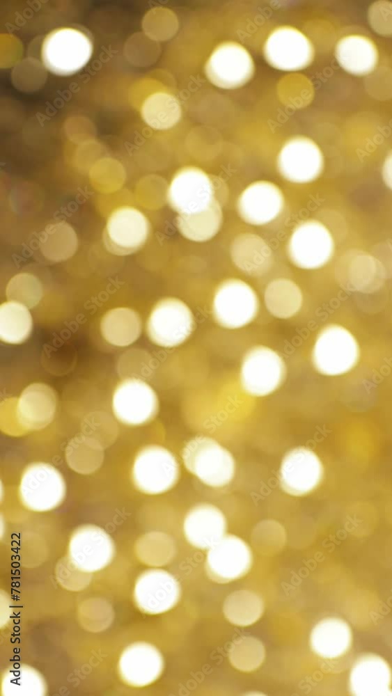 Gold Shiny Bokeh. Energetic, rapid, shimmering golden bokeh. Vertical video. Gold Shiny Bokeh. Energetic, rapid, shimmering golden bokeh. Vertical video.