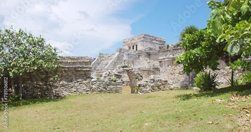 Ancient Mayan Ruins Under Blue Skies at Tulum Archaeological Site, Mexico