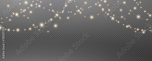 Christmas garland isolated on transparent background. Glowing colorful light bulbs with sparkles.Xmas, New Year, wedding or Birthday decor. Party event decoration. Winter holiday season element. photo
