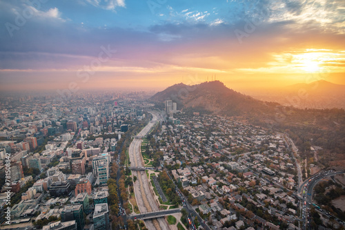 Santiago aerial view with San Cristobal Hill and Mapocho River at sunset - Santiago, Chile