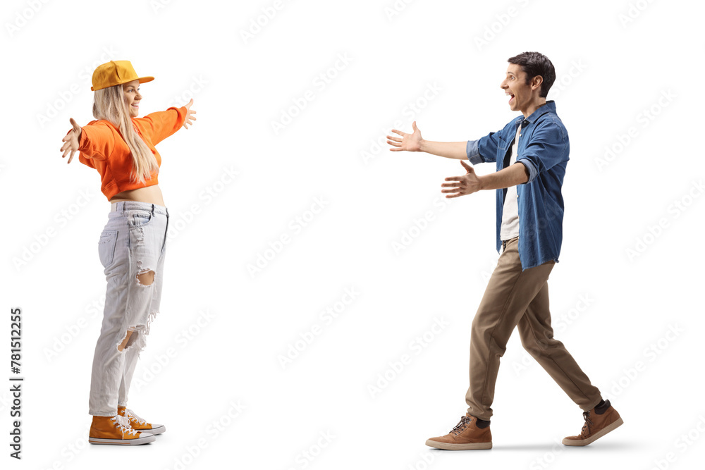 Full length profile shot of a young man and woman meeting and greeting each other - obrazy, fototapety, plakaty 