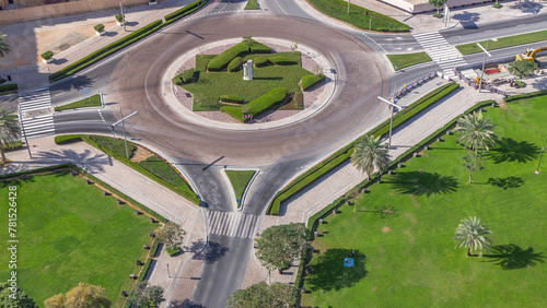Aerial view of a roundabout circle road in Dubai downtown from above timelapse. Dubai, United Arab Emirates.