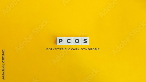 PCOS, Polycystic Ovary Syndrome. Text on Block Letter Tiles and Icon on Flat Background. Minimalist Aesthetics. photo