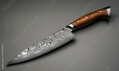 Japanese chefs knife made of damascus steel with a sharp blade and intricate pattern on the blade There is an elegant wooden han