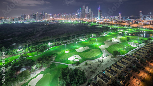 Photography Dubai Marina skyscrapers and golf course night timelapse, Dubai, United Arab Emi