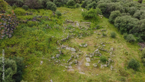 domus de janas and nuraghe of santu Barbara ancient nuragic tombs in Bauladu sardinia central photo