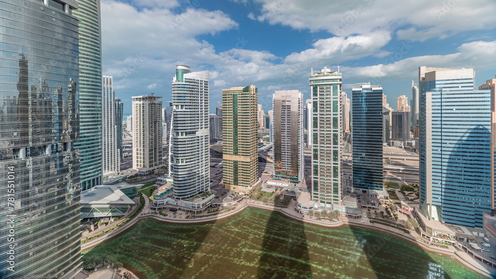 Fototapeta premium Residential apartments and offices in Jumeirah lake towers district timelapse in Dubai