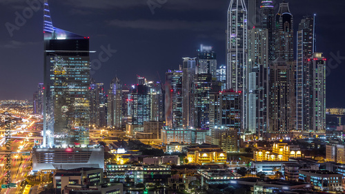Dubai Media City with Modern buildings aerial night timelapse, United Arab Emirates © neiezhmakov