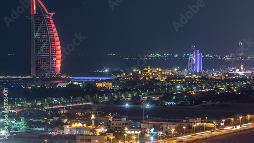 Aerial view of Burj Al Arab hotel from Internet city night timelapse. photo