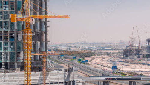 Dubai skyline with construction aerial timelapse photo