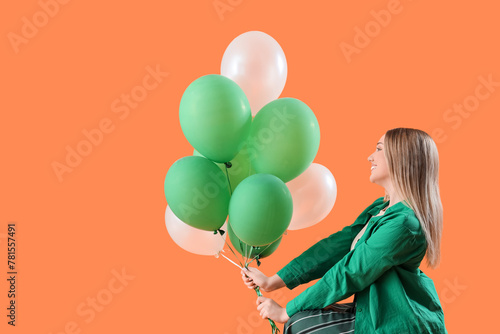 Young woman with balloons o...