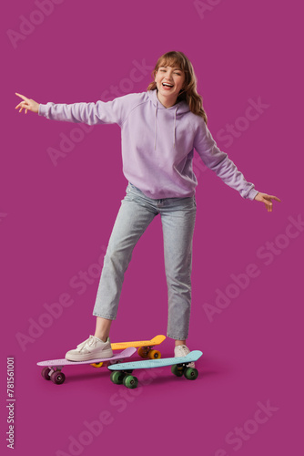 Young happy woman with skat...
