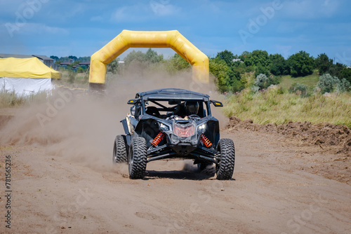 UTV buggy, ATV (quad), 4x4 in the action on sand