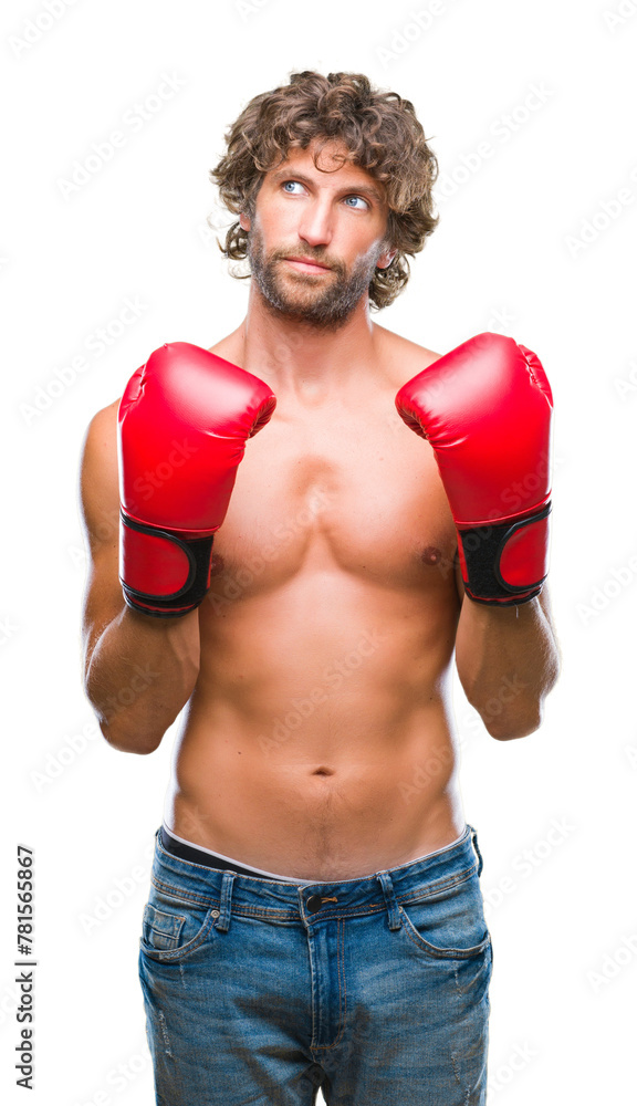 Handsome hispanic boxer man wearing boxing gloves over isolated background smiling looking side and staring away thinking. Handsome hispanic boxer man wearing boxing gloves over isolated background smiling looking side and staring away thinking.