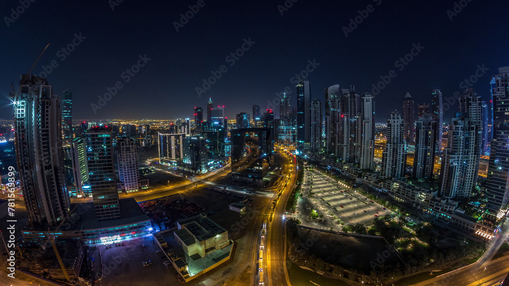 Panorama of Business bay Dubai night to day aerial timelapse.