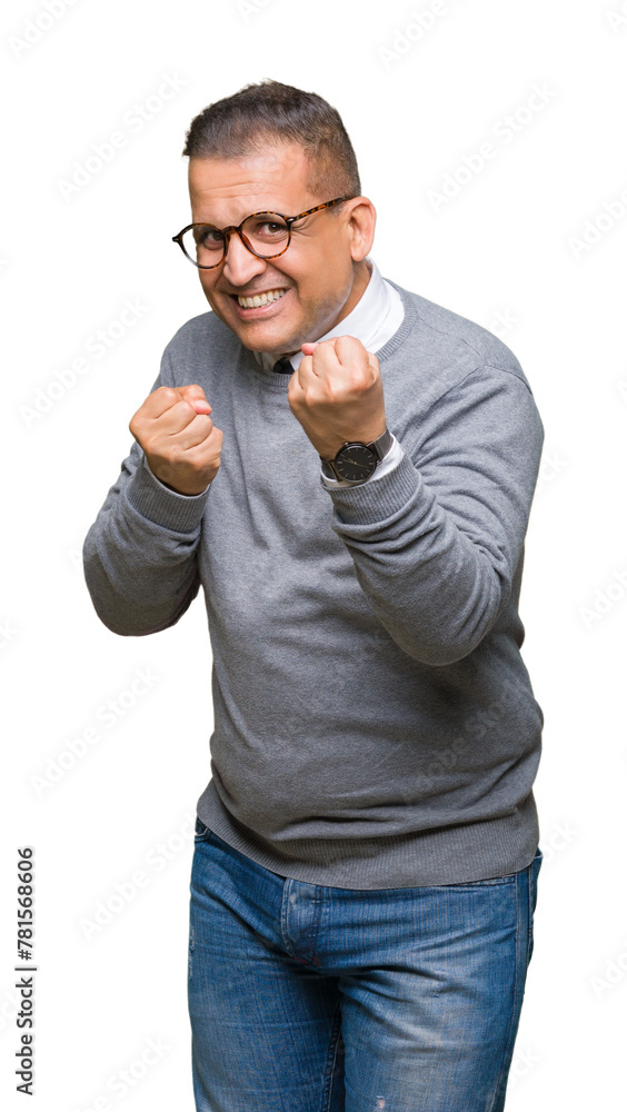 Middle age bussines arab man wearing glasses over isolated background Ready to fight with fist defense gesture, angry and upset face, afraid of problem Middle age bussines arab man wearing glasses over isolated background Ready to fight with fist defense gesture, angry and upset face, afraid of problem