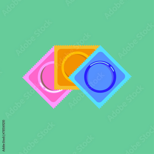 condoms in colored packages. three colored packages of condoms. sealed condoms.