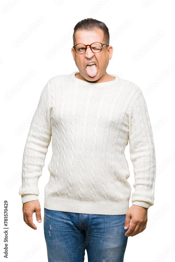 Middle age arab man wearing glasses over isolated background sticking tongue out happy with funny expression. Emotion concept. Middle age arab man wearing glasses over isolated background sticking tongue out happy with funny expression. Emotion concept.